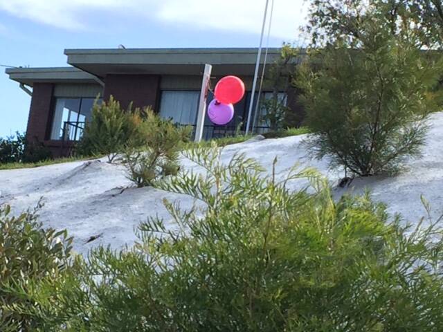 KIND GESTURE: Balloons were recently displayed in Merimbula by a thoughtful person who wanted to mark their neighbour's birthday. 