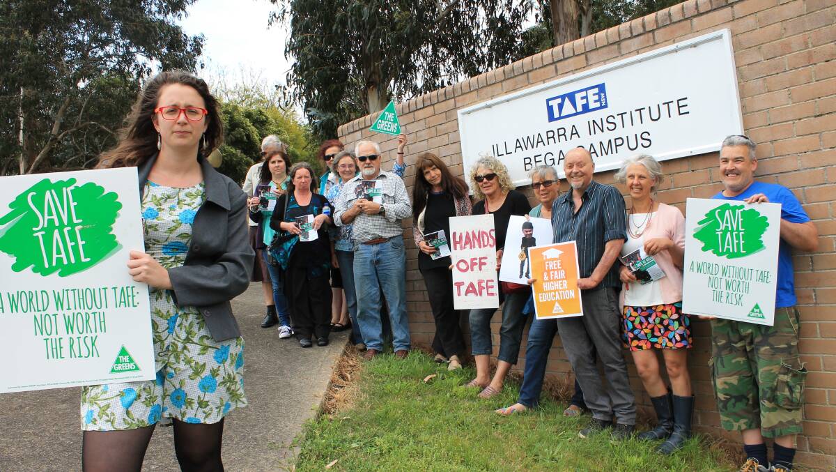 Snap action: Bega Valley Greens member Tamara Ryan, party members and concerend citizens protest outside Bega TAFE campus. Some protesters did not want to be photographed. 