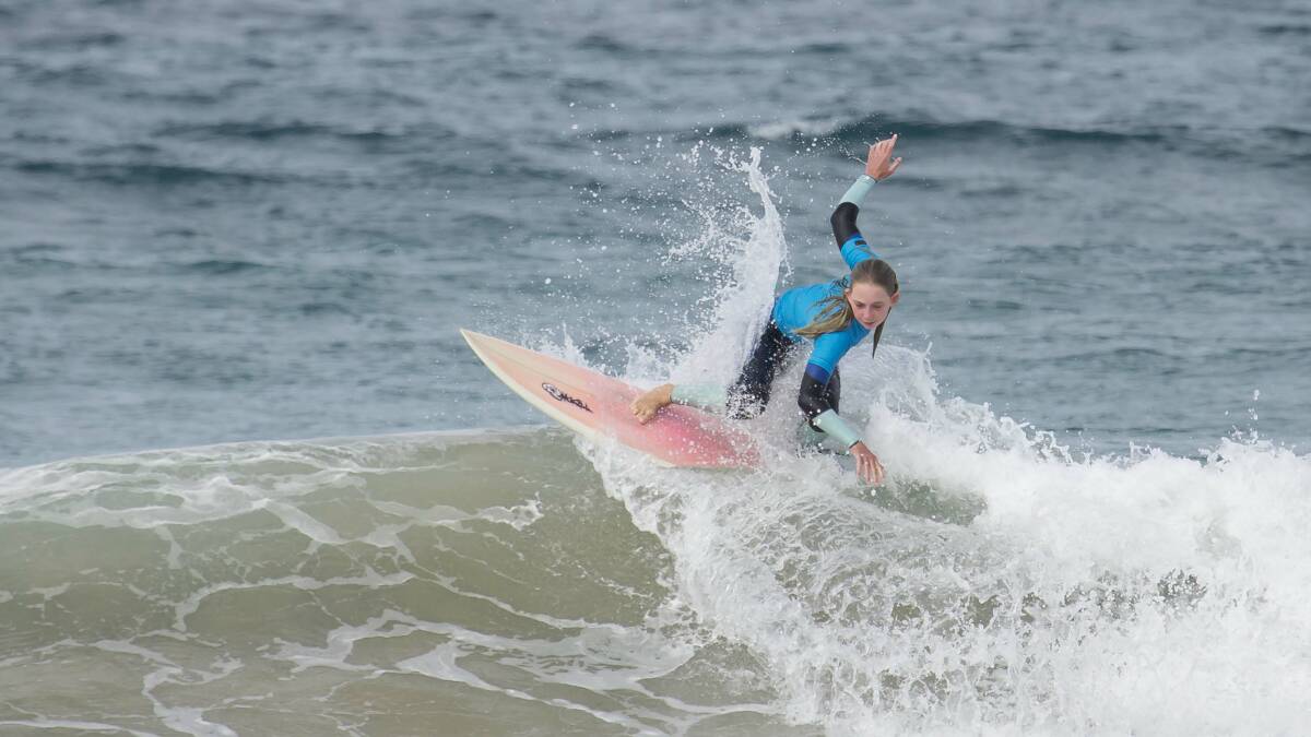 State surfing: Arabella Tarpey in action during a local Boardriders competition at Merimbula's Main Beach recently. picture: Steve Burrows 