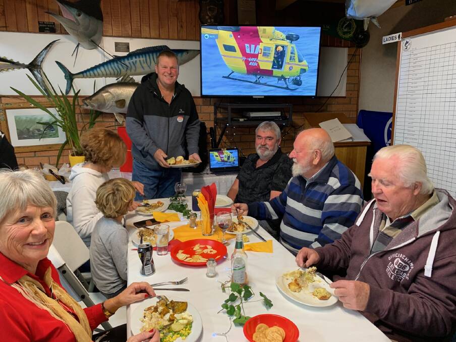 Great night: Merrily Bell, left, organised fund-raising for the Westpac Rescue Helicopter through a casserole night at MBGALAC clubhouse last week. 