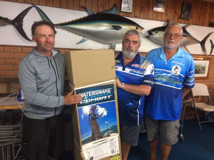 Challenge winner: Ian Neilson of Merimbula receives the major prize for his catch and release bream from Ron Vanderdrift of Tackle World Merimbula and Club President Peter Haar.