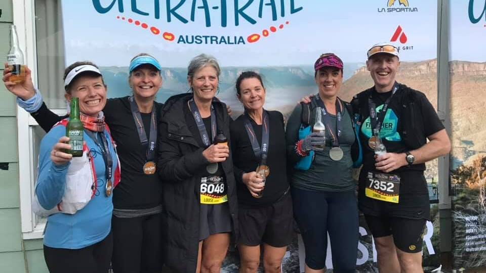 Going the distance: Jacqui Smith, Tina Piccione, Louise Loudon, Sandra Foley, Kirsty Byrne and Simon Byrne all smiles after completing the 50km.