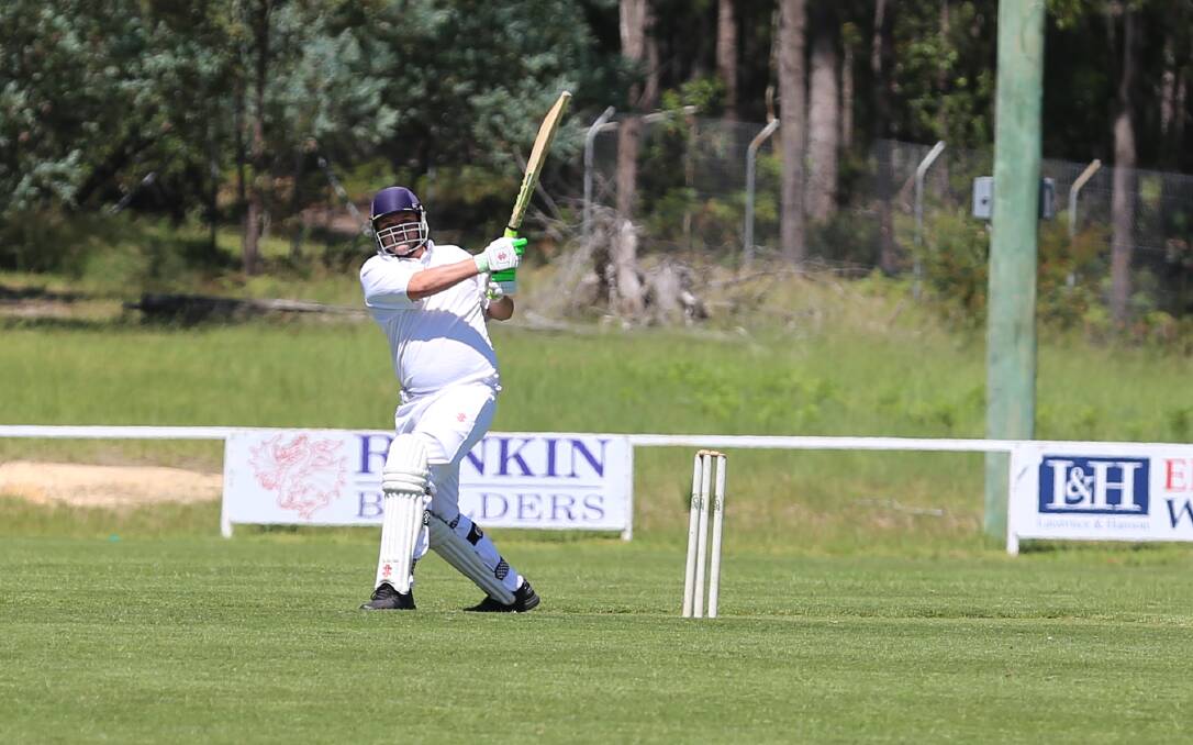 A Bluedog batsman watches the ball sailing towards the boundary in the club's opening innings against the Tathra Sea Eagles on Saturday. 