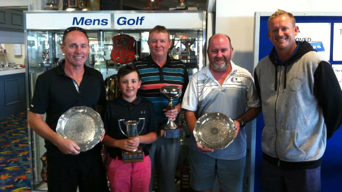 Silverware claimed: The delighted prize winners from the Tura Beach men's golf monthly medal and club championship rounds at the presentation on the weekend.