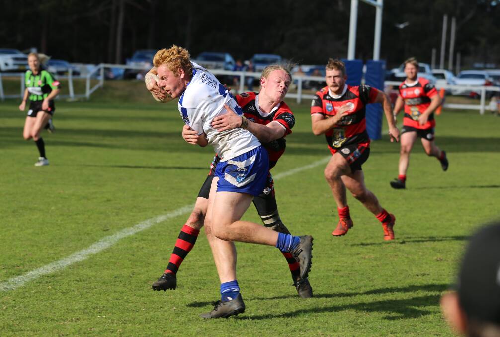 Billy Doneman reaches for the try-line as the Merimbula-Pambula Bulldogs establish a lead over Snowy River on Saturday. 