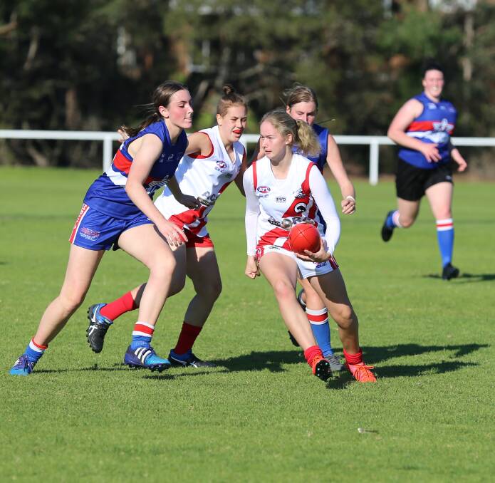 Males and females over 14 are all encouraged to get involved in the AFL 9s social draw starting in Merimbula next week. 