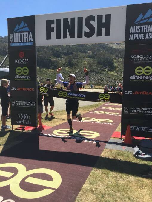 champion: Kyle Bourke crosses the line of the Australian Alpine Ascent, finishing first in the inaugural trail run, while Lisa Lukassen also won her division. 