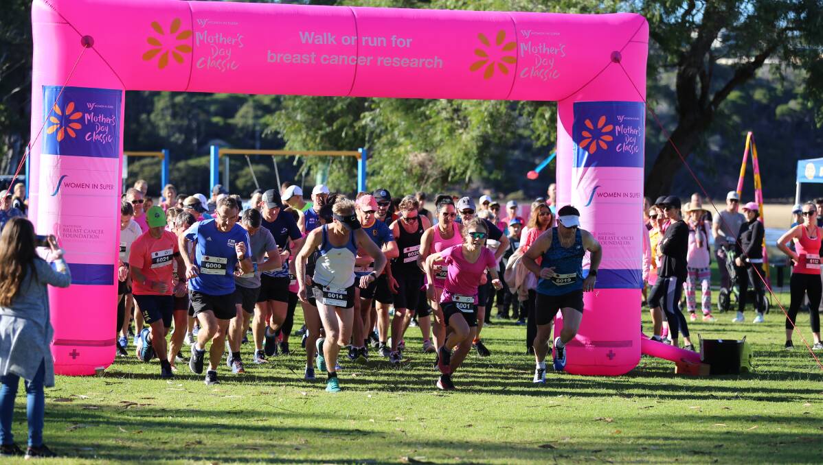 The 10km runners fire off the line at the start of the Merimbula Mother's Day Classic on Sunday morning. 