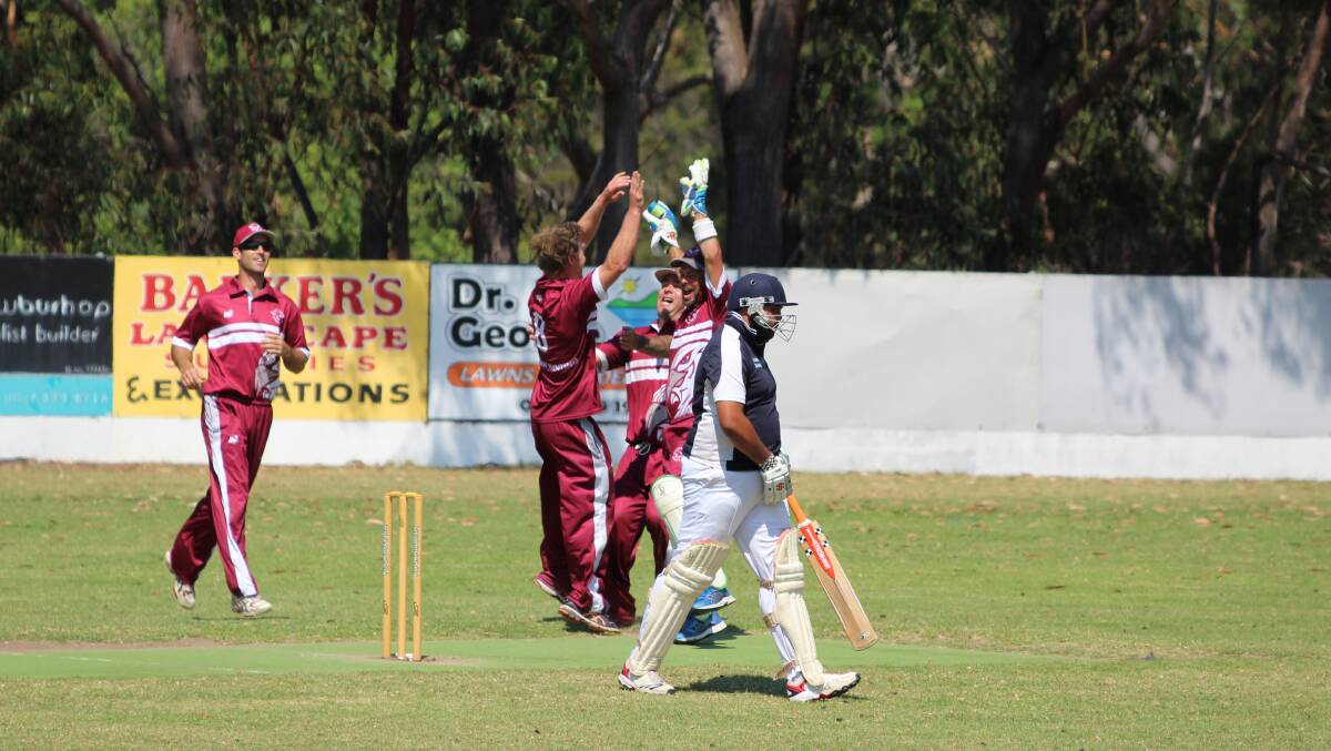 Tathra players celebrate a catch as Rhys Cunningham claimed another wicket in the Far South Coast Cricket Association grand final on Saturday. 