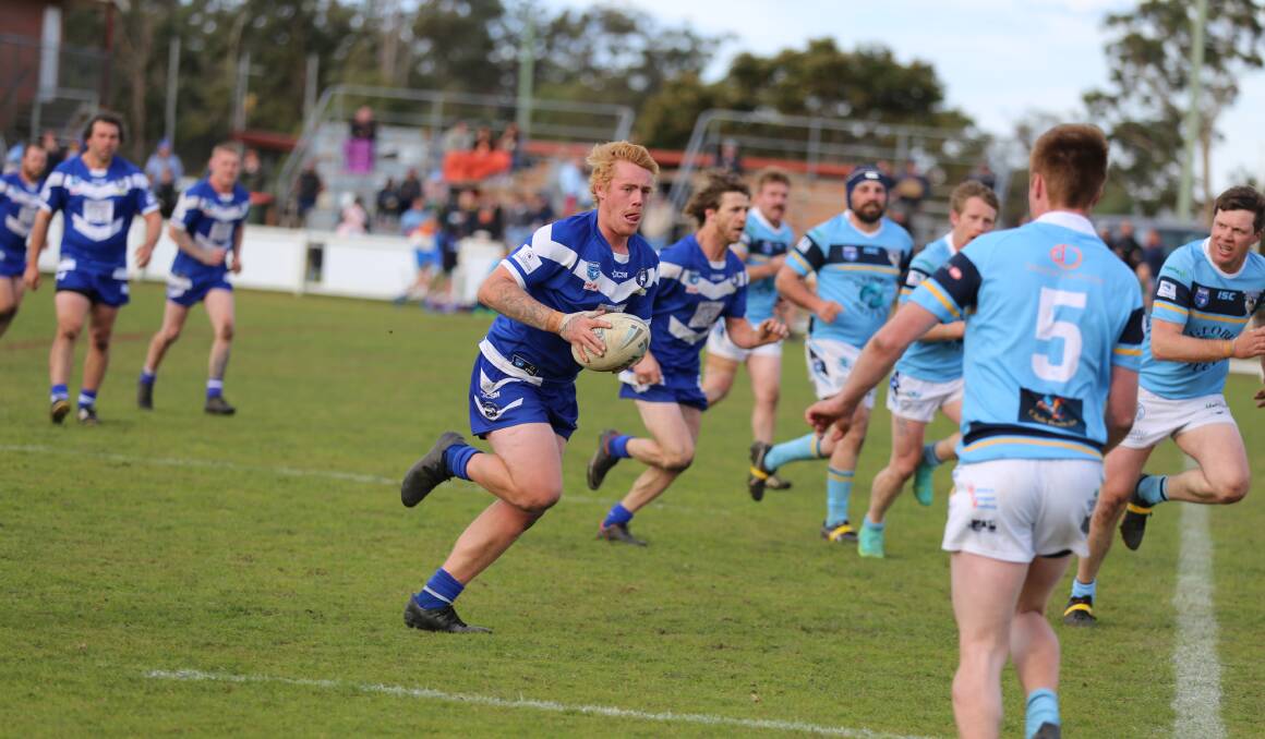 Billy Doneman makes a break for the Bombala try line with inside support from Aidan Aitken on Sunday. 