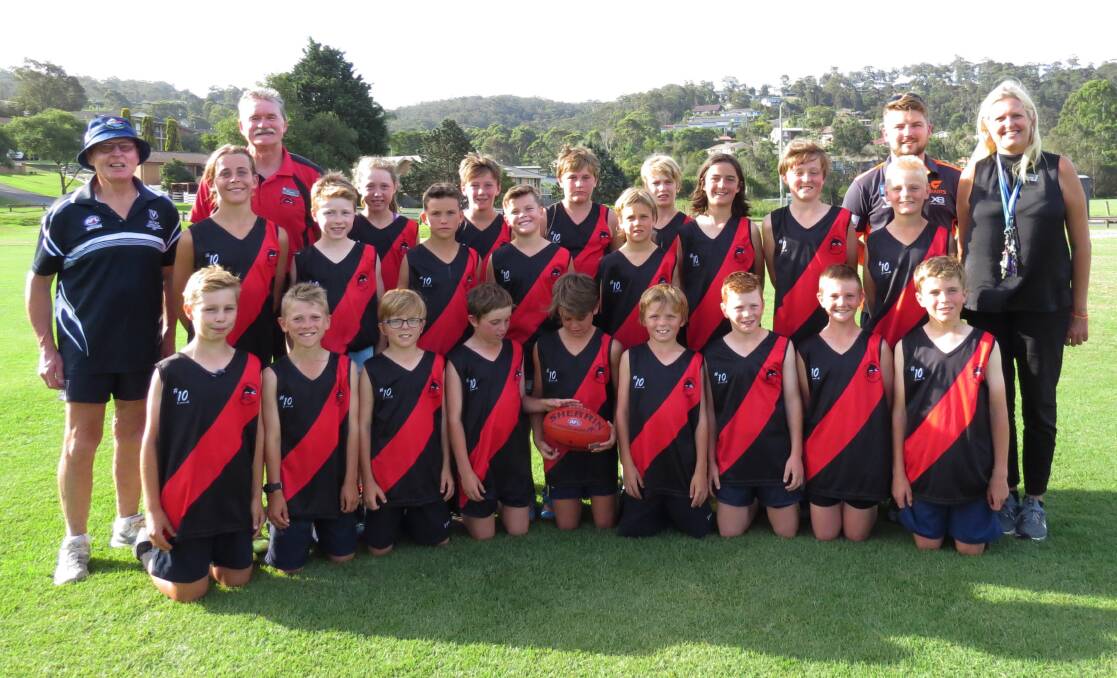 Young reps: Neil Rainbow, Phil Jackson, Mitch Wallis and Michelle Hulme with the FSC Imlay Bombers in their team jumpers. Picture: Shirley Rixon.