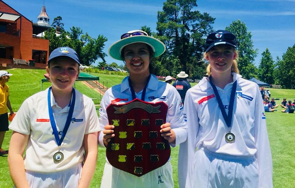 Champs: Yasmin Welsford, Jessie Mudaliar and Jemma Pollock with the shield from their ACT under 15 girls team victory. Picture: Facebook.