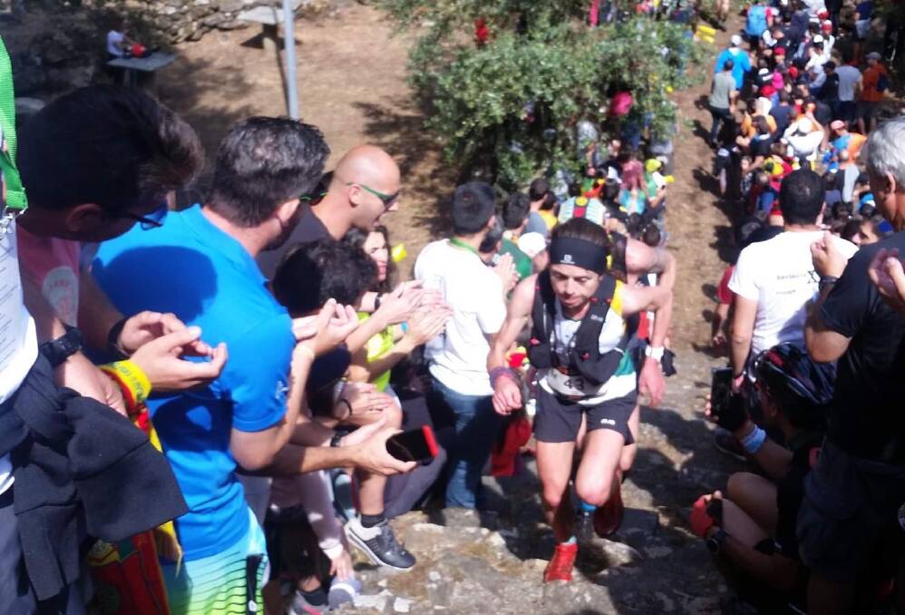 Running up that hill: Trail championship fans cheer on Steph Auston during one of the steep climbs in the 44km long course in Portugal. Picture: supplied. 