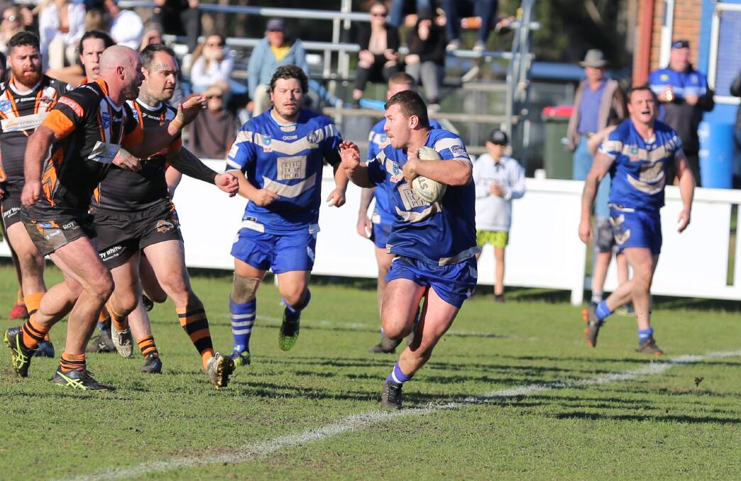 Jack McGuire makes a run against the Bay Tigers recently, with the front rower scoring two tries in the Bulldogs' gutsy win over Cooma. 