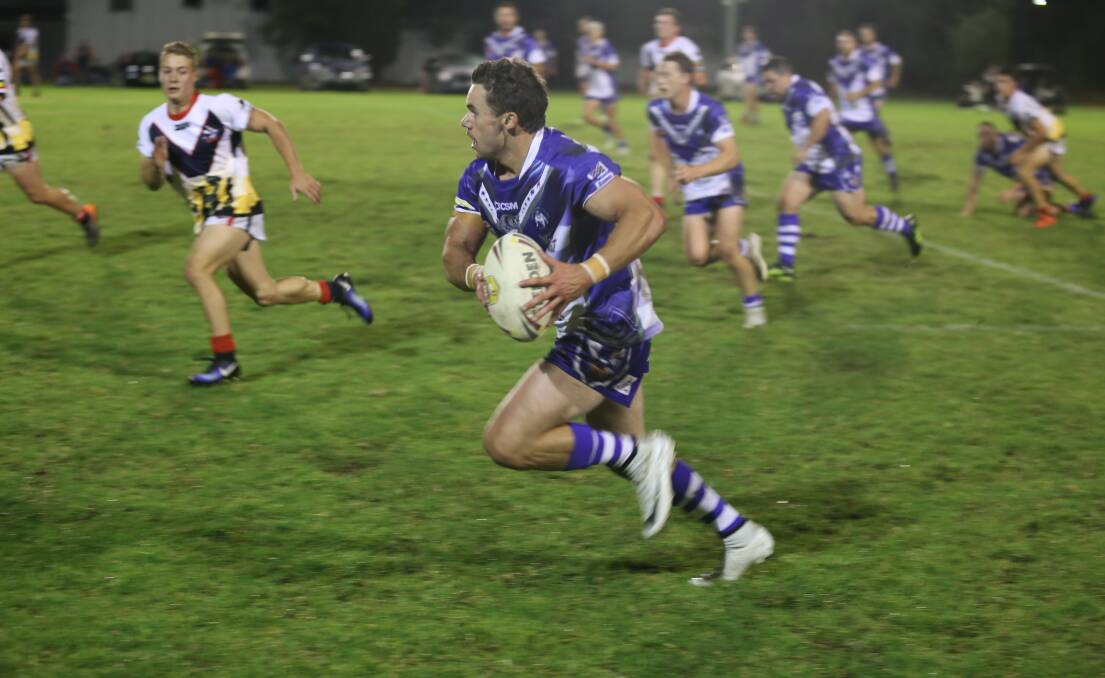 Try scorer: Bulldogs winger Luke Rixon makes a burst up the edge in a close contest with the Bega Roosters on Saturday night. 