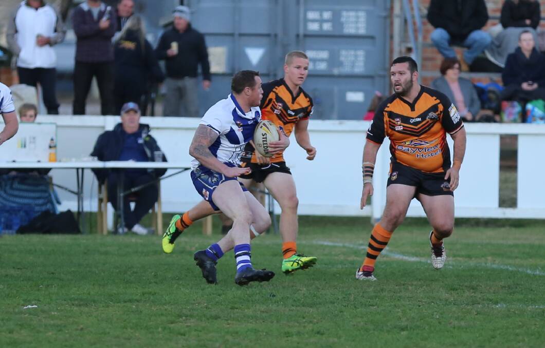 Grant Moon runs a hit up against Batemans Bay recently with a win over Narooma on Sunday setting up a tough run to finals for the Bulldogs. 