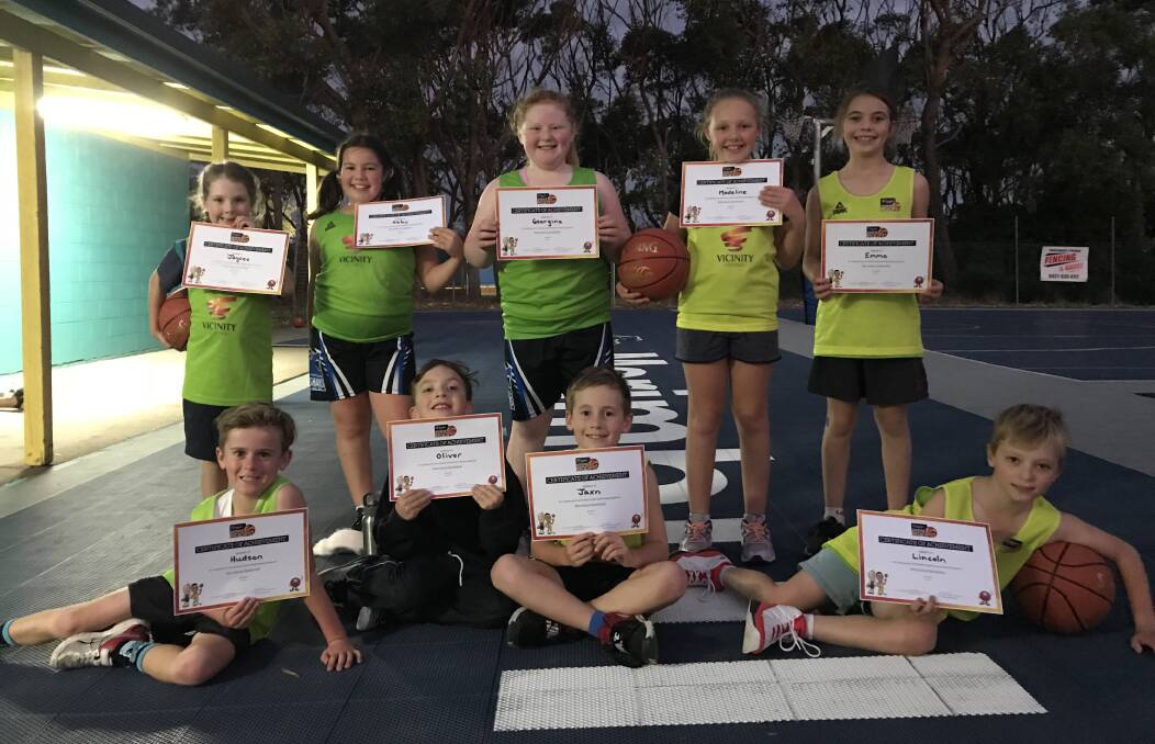 Over for now: Some of the juniors from the Hoops program finish up the season with their certificates on Wednesday. 