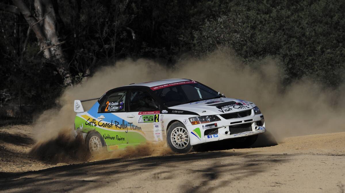 National crown: Australian Rally Champion Nathan Quinn sideways in his Lancer during the 2016 ACT Rally will contest the Bega Valley Rally on June 9-10. 