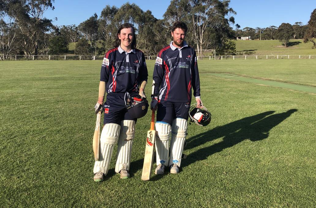 Record breaking: Matt Lawson and Brendan Daley elated - and exhausted - after a 270-run partnership to defeat Wolumla on Saturday. 