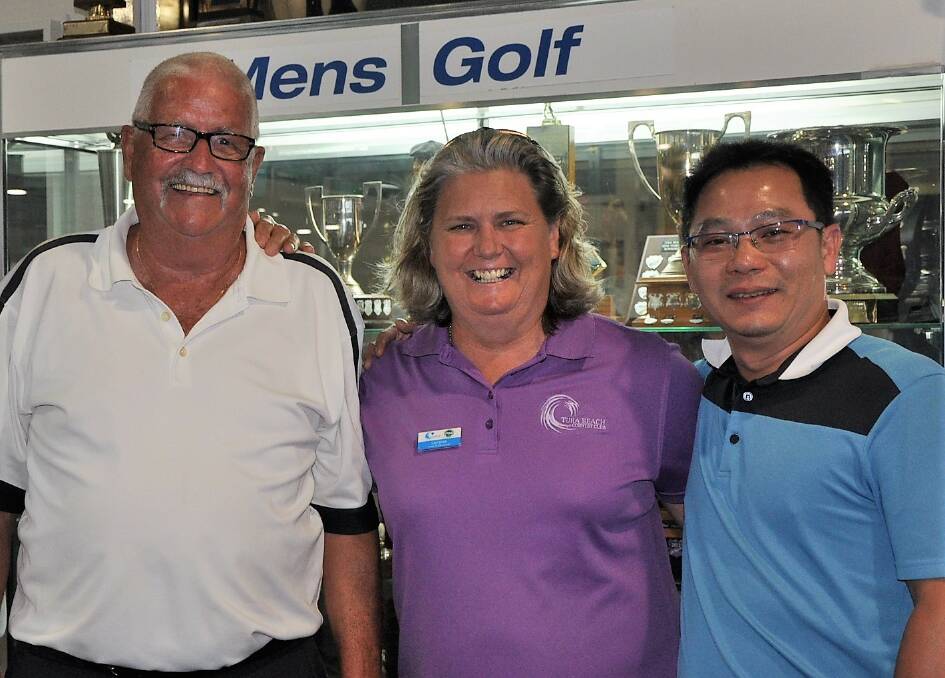 Count-back race: Tura men's golf monthly medal winner Ian Scott with sponsor Loraine Lambert and runner-up Minh Nguyen. 