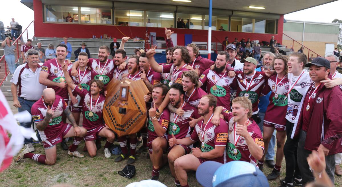 The Tathra Sea Eagles celebrate a 2019 first grade premiership with the shield going back in the cabinet until 2021. 