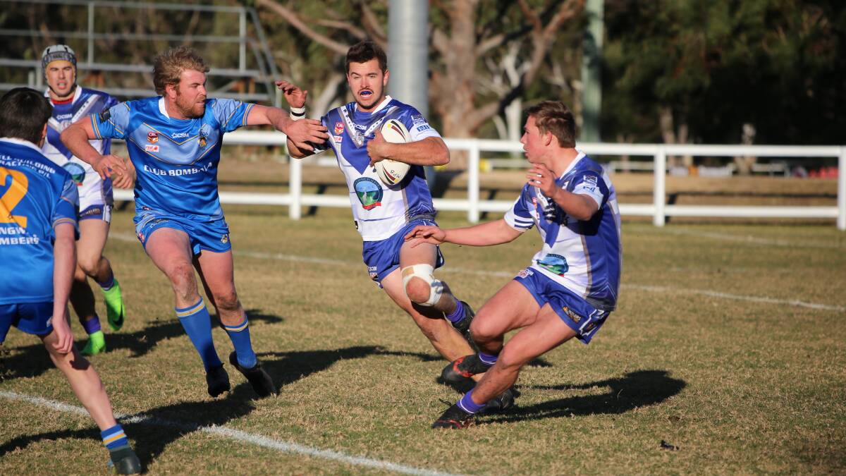 The Bulldogs, pictured in a previous encounter with Bombala, secured a round one win over the Bay Tigers 32-20. 