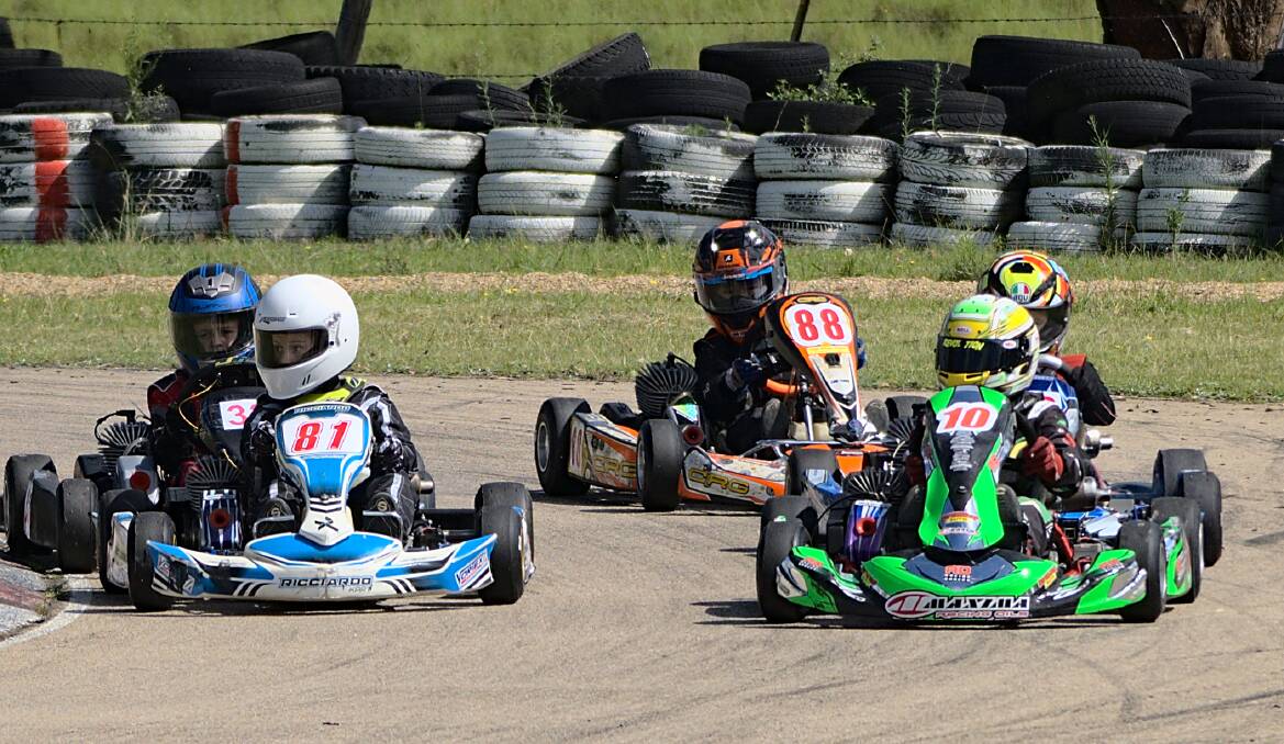 Grouped: The Cadet 12s class are tightly bunched around the apex of a corner during the opening round at the Sapphire Coast Kart Club. PIctures: Andrew Larkin. 