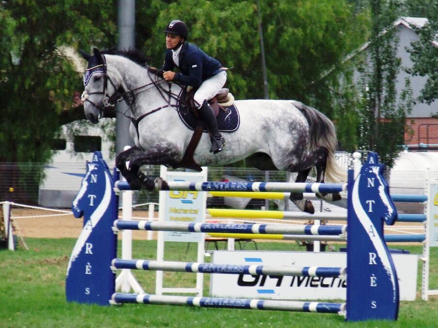 Home favourite: Bega contender and last year's runner-up Clint Beresford jumps SL Donato clear of one of the higher rails during last year's Showjumping Cup. 