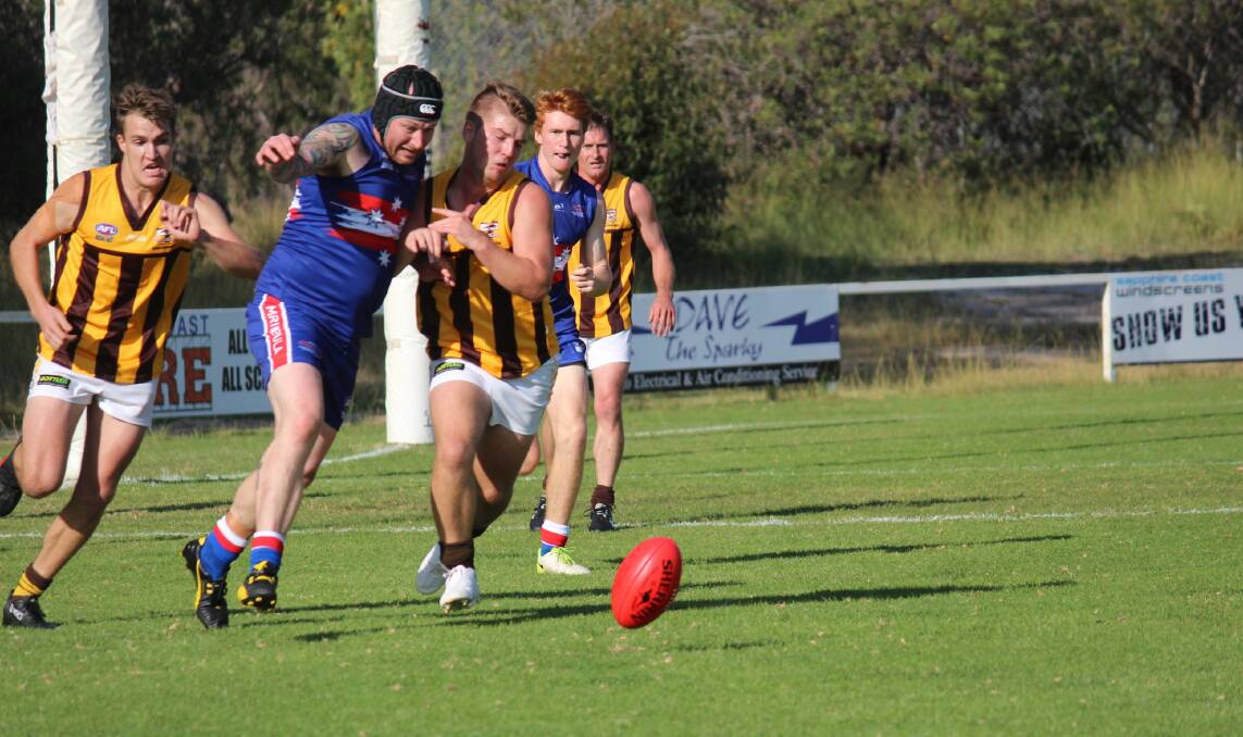 front lines: Seen here in an outing against the Pambula Panthers, the Merimbula Diggers proved too good for the Whalers in the wet on Saturday. 