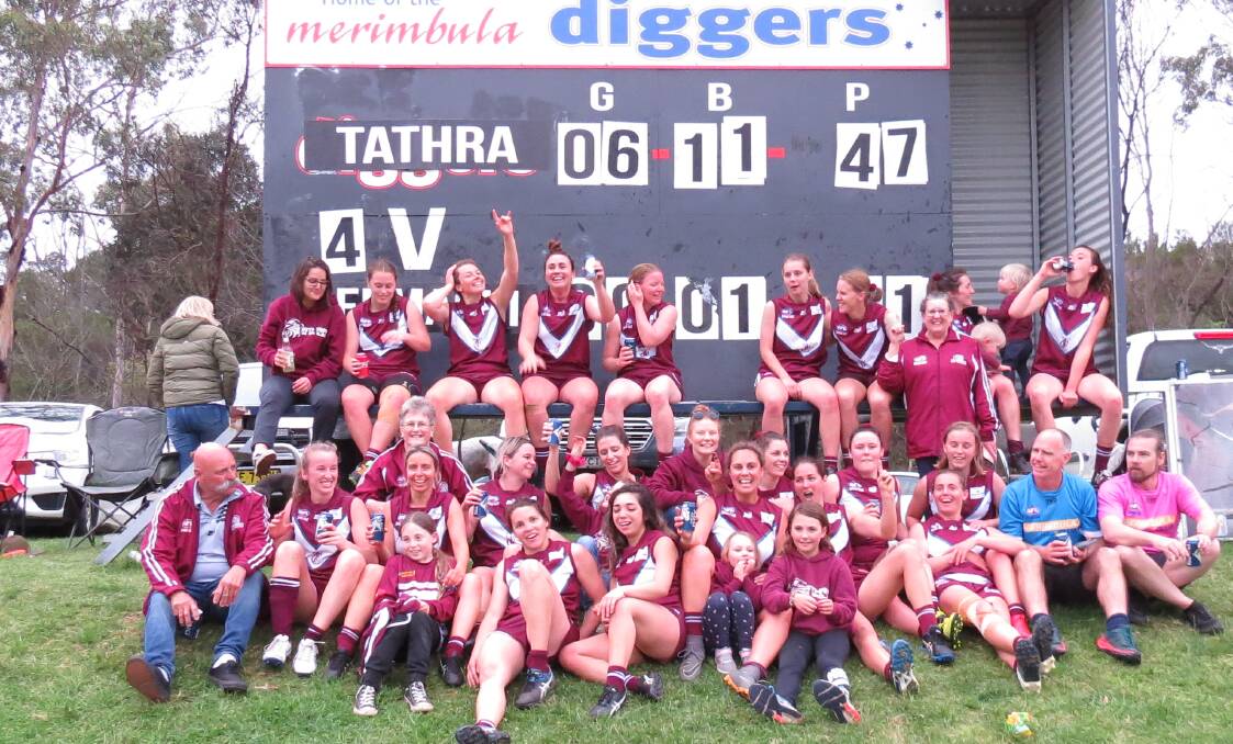 Flag winners: The Sea Eagles ladies squad celebrate their first premiership after defeating Bermagui on Saturday. Picture: Shirley Rixon. 