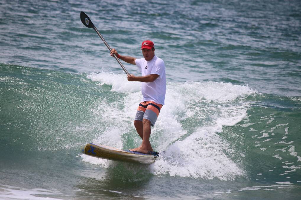 Saturday morning's SUP relay is a fan favourite for spectators and surfers at the Merimbula Classic. 