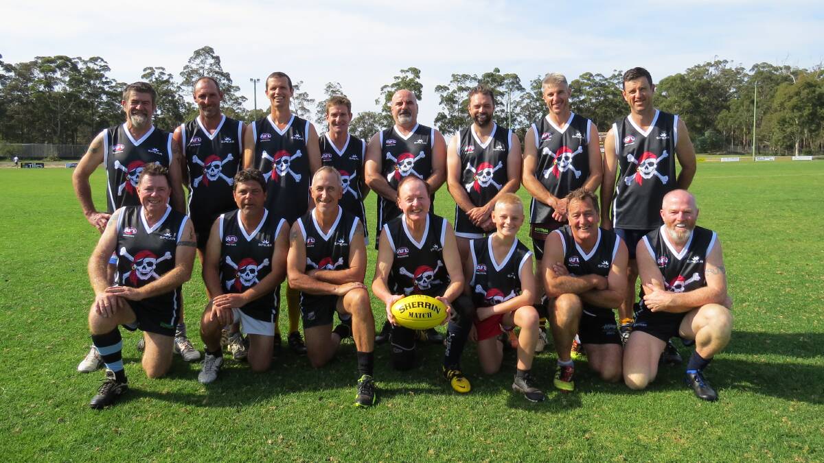 Plundering: The South Coast Buccaneers assemble for a team photo during the Easter Masters AFL carnival at the Pambula Sporting Complex. Picture: Shirley Rixon. 