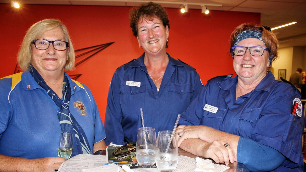 CONNECTIVITY: Pambula-Merimbula Lions Club's Robyn Bedford with marine Rescue NSW Merimbula members Sonia Teston and Fay Cousin. Picture: Alasdair McDonald