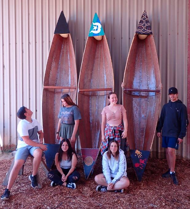 EMHS students with their handcrafted canoes at the completion of the 2020 program. Photo: Carina Severs, Eden Community Access Centre