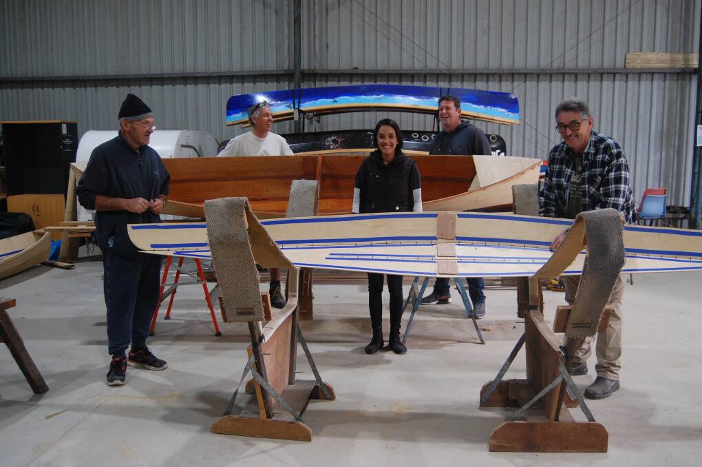CRAFTING CANOES: Bob Kulibab, Michael Palmer, Stacy Muscat, Toby Markham and John Avent. The next EMHS workshop will be held in September. Photo: Leah Szanto