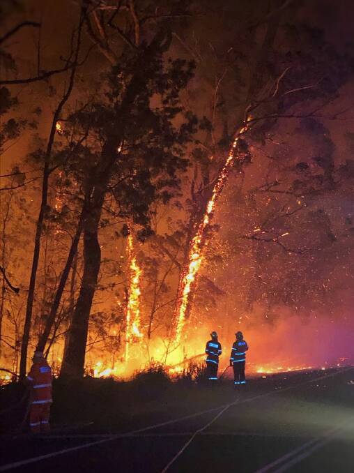 Firefighters battle the Currowan bushfire burning at emergency level north of Batemans Bay. Picture: Stock image 