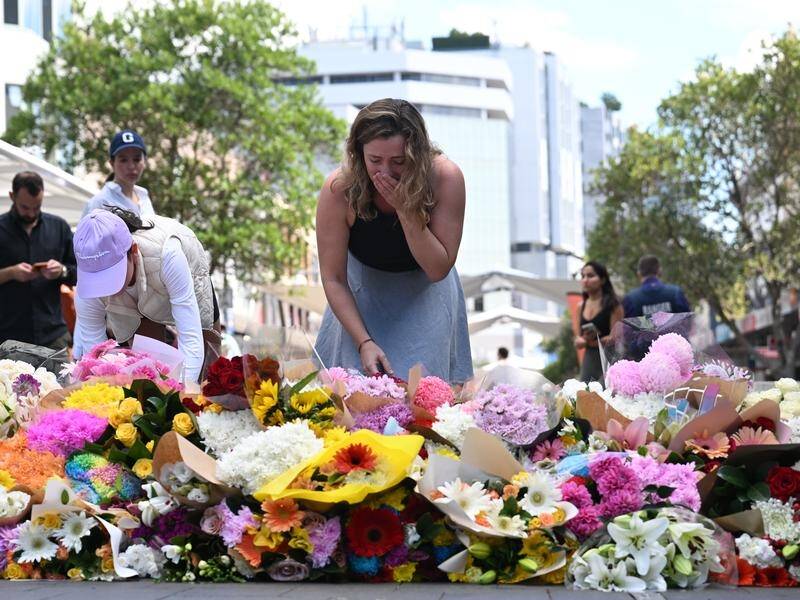 Sydney is mourning six people who were stabbed to death in a violent rampage at Bondi Junction. (Dean Lewins/AAP PHOTOS)