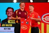 Jed Walter (l) was one of four early picks for Gold Coast's Damien Hardwick (r) in the AFL draft. (Morgan Hancock/AAP PHOTOS)