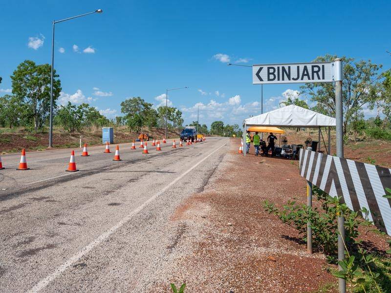 An unvaccinated woman from Binjari community has become the NT's first COVID-19 fatality.