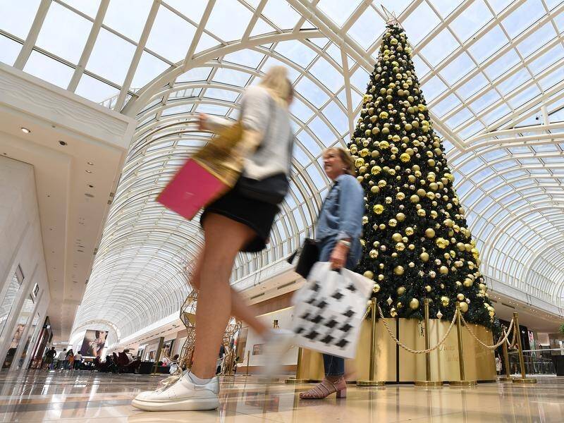 Aussies will spend less on Christmas presents and hunt for more bargains this festive season.