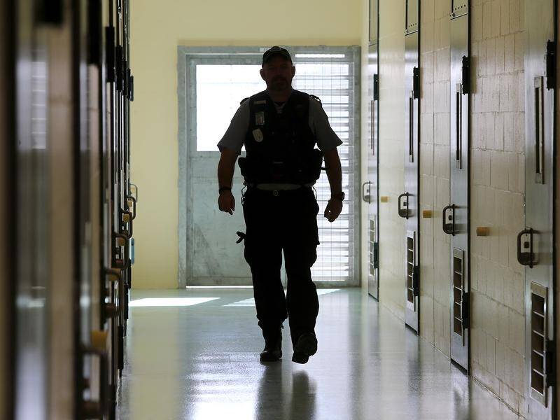 A report by the state's corruption watchdog into Queensland's prison system is due to be released.