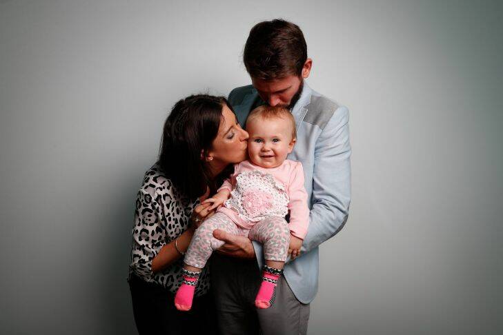 Bethan McElwee and Jonathan McElwee with their 1-year-old daughter Aviana, who visited Parliament House in Canberra for a Spinal Muscular Atrophy Australia event, on Wednesday 16 August 2017. fedpol Photo: Alex Ellinghausen