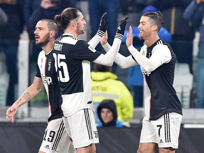Cristiano Ronaldo (R) opened scoring for Juventus as they cruised past Roma in the Italian Cup.