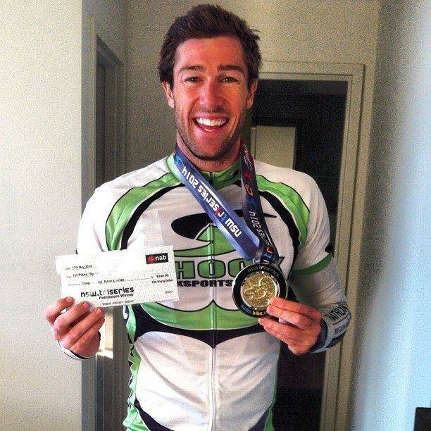 • Andrew MacNamara celebrates his win of the Elite Energy NSW Triathlon Tri-Series champion. 