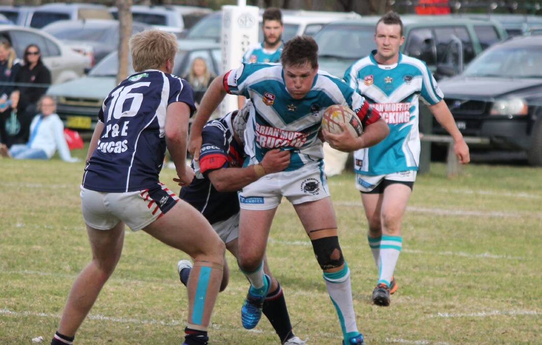 • Wade Irvin (with ball) will lead the Panthers’ forward pack against the Cooma Stallions on Sunday. 