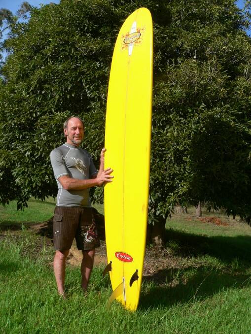 Henry Jones with the big Malibu board that he used to save the Victorian tourists caught in a rip. 
