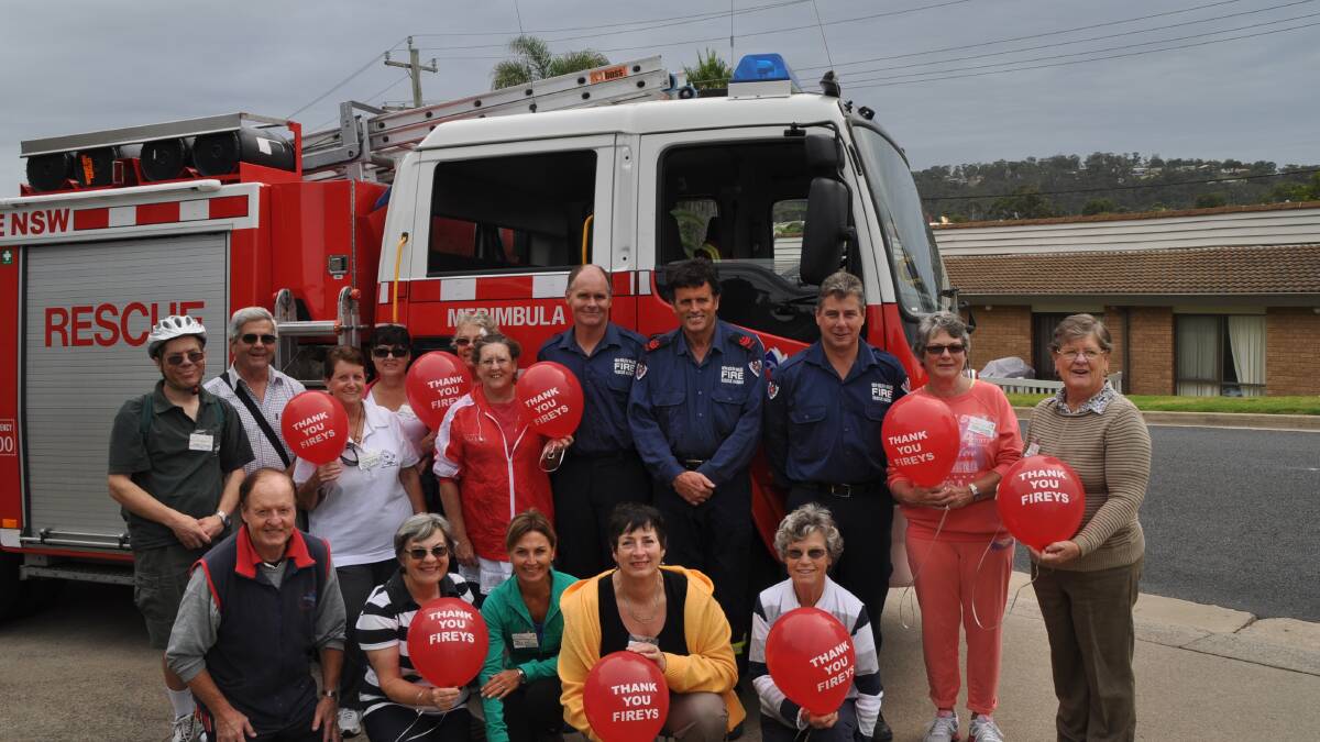 Merimbula fire fighters, Craig Dickman, Mike Duncan and Rod Rowland with Sapphire Coast Walkers showing their gratitude for the work of our local fire fighters.  