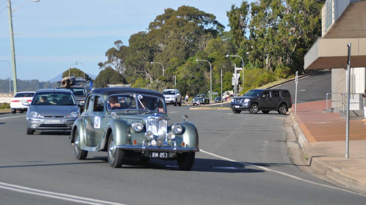 Cars from the Royal Automobile Club of Victoria drove through Merimbula on their Fly the Flag tour.
