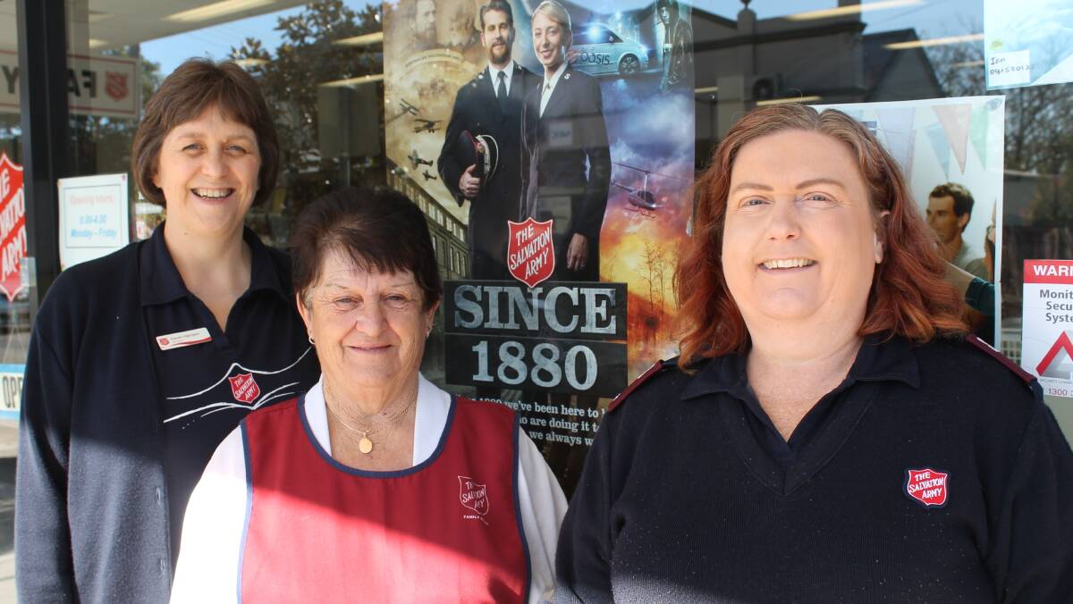Salvation Army Lieutenants Karen Harrison and Lesley Newton, and Bega Salvos store staff member Dot Chapman are ready for this week's Red Shield Appeal.