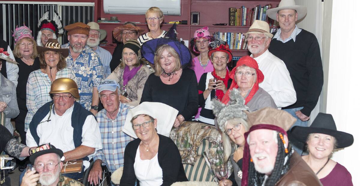 Wild night: Members of the Rotary Club of Merimbula gather at for a fun-filled crazy hat night raising money for Australian Rotary Health. 